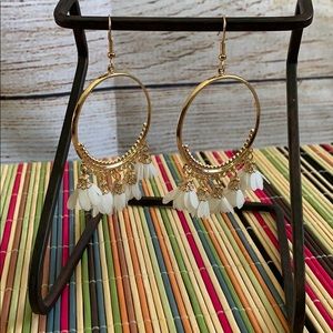 Pair of Gold Tone Hoop Earrings w/ White Flowers